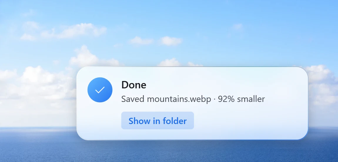 Santra's "Done" notification on a Windows desktop, saying mountains.webp was saved 92% smaller, with a Show in folder button